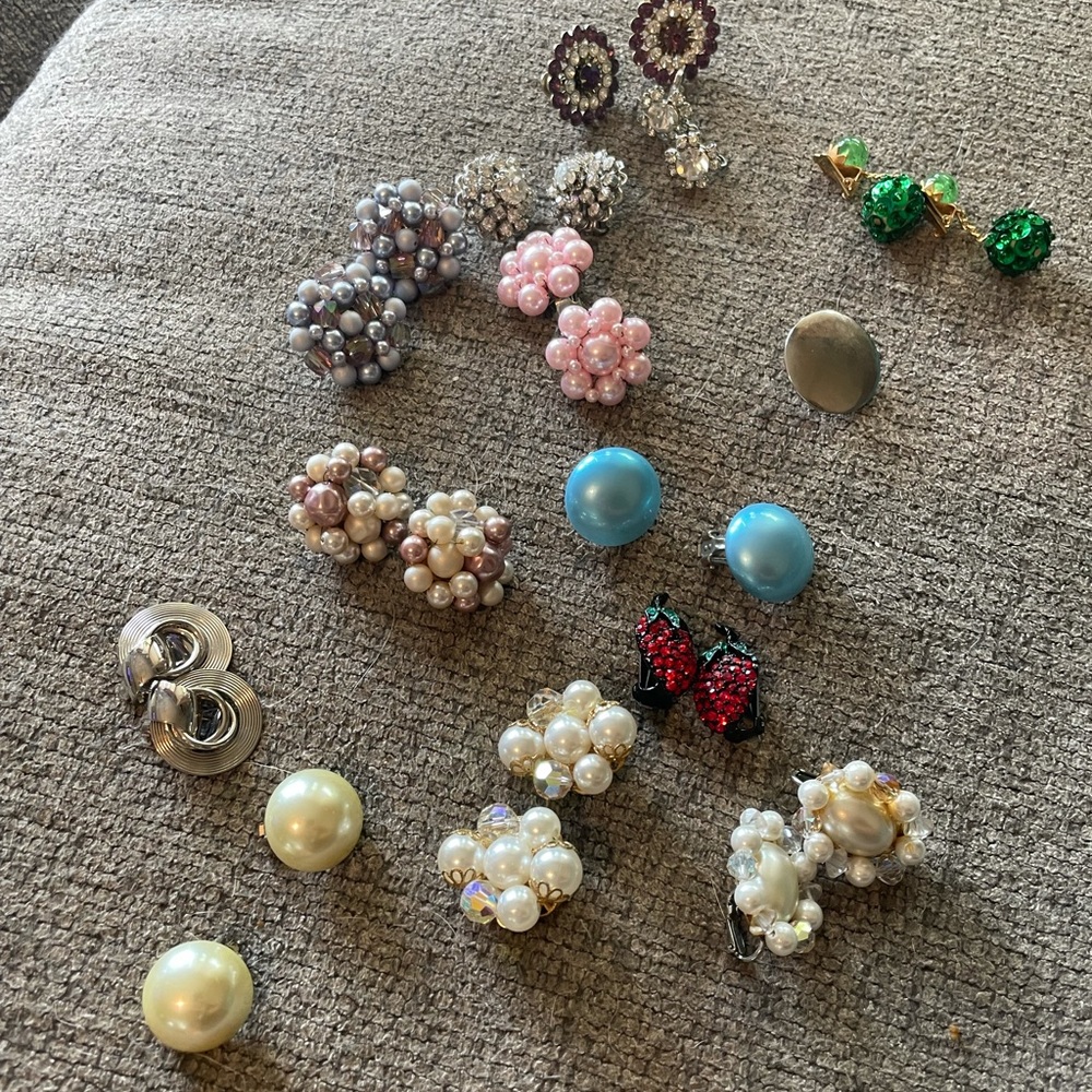 Assortment of clip on earrings.